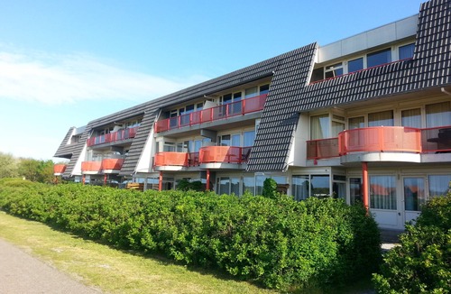 Buren Apartment | Ameland - apartment with balcony to the south side with a view of meadows and the village of Buren