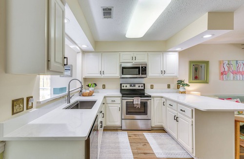 El Centro Beach House | Breezy PCB Vacation Rental w/Lanai, Walk to Ocean