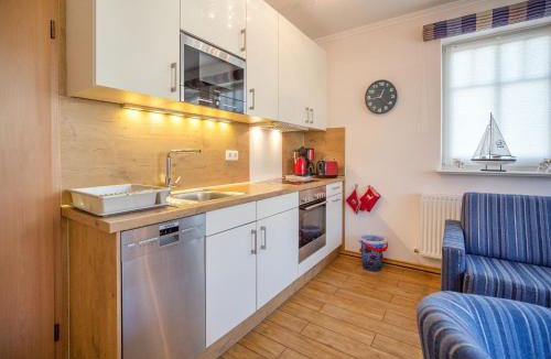 Binz Apartment | Dünenpark Binz - Komfortplus Ferienwohnung mit 1 Schlafzimmer und Balkon im Dachgeschoss 210