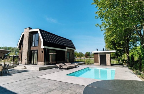 Waarland House | Luxury 12-person villa in Waarland with 6 bedrooms, private indoor pool, hot tub, and plenty of peace, space, and comfort.
