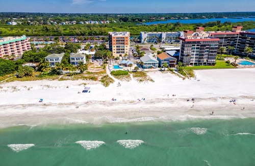 Redington Shores Apartment | Redington Beach Retreat - Immaculate Beach Condo with Water Views, Pool, Hot Tub