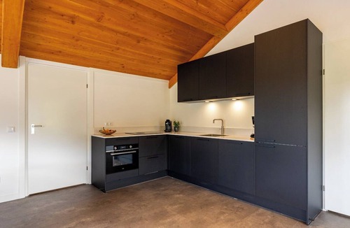 Otterlo House | Spacious wellness home for 6 guests with a private sauna and hot tub in the garden. Stylish, single-floor layout and designed for pure relaxation.