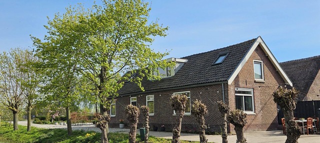 Detached vacation home Mondrian near Amsterdam along river in nature in abcoude