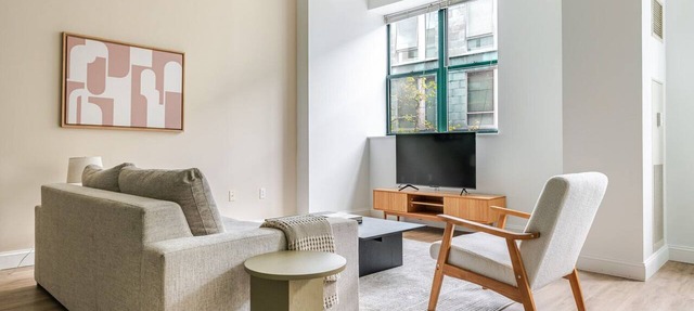 Divine Central Square 2BR w/Fitness, close to Dining, by Blueground in Cambridge