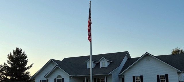 Fully custom modern four bedroom home on 13 acres with a stocked pond. in Murphysboro