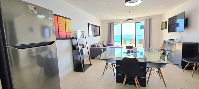 Oceanfront white sand beach condo in Cancun