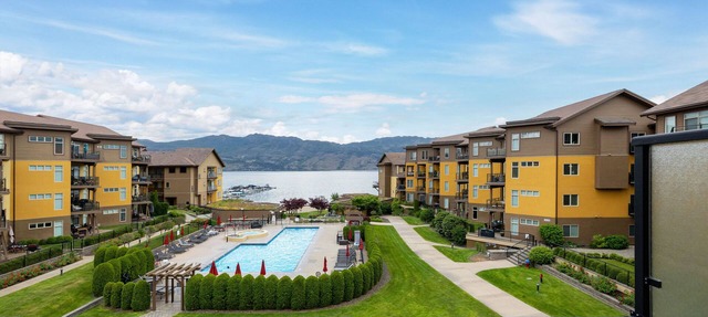 Okanagan Lake Beachfront Penthouse. 2 Bedrooms + den, 3 bath. Boatslip Option. in West Kelowna