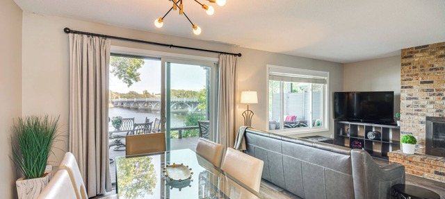 Riverfront Champlin Townhome w/Deck & Water View! in Champlin