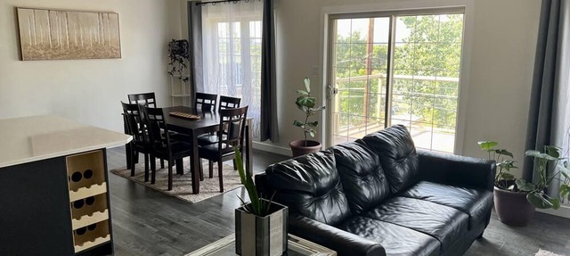 spacious 5 bedroom home with a game room, walk-in basement, and overlooking deck in Prince Albert