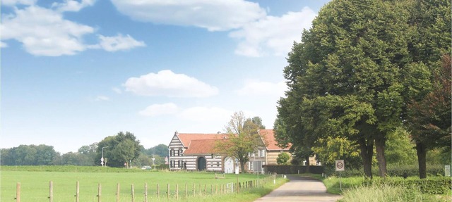 This characteristic square square farmhouse is beautifully situated in the South Limburg hills. in Nuth