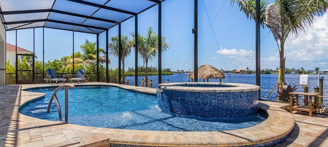 Waterfront Fun, Private Beach, Pool, Spa & Games - Laguna Lake House - Roelens in Cape Coral